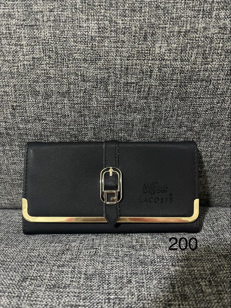 Lacoste Black Wallet (Category: Wallets & Card holders) located in Quezon City. Submitted by tresheaven (Listing ID 1459628704, Image 1). Description: .