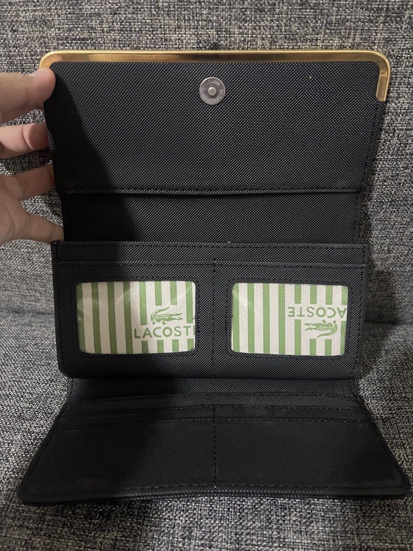 Lacoste Black Wallet (Category: Wallets & Card holders) located in Quezon City. Submitted by tresheaven (Listing ID 1459628704, Image 2). Description: .