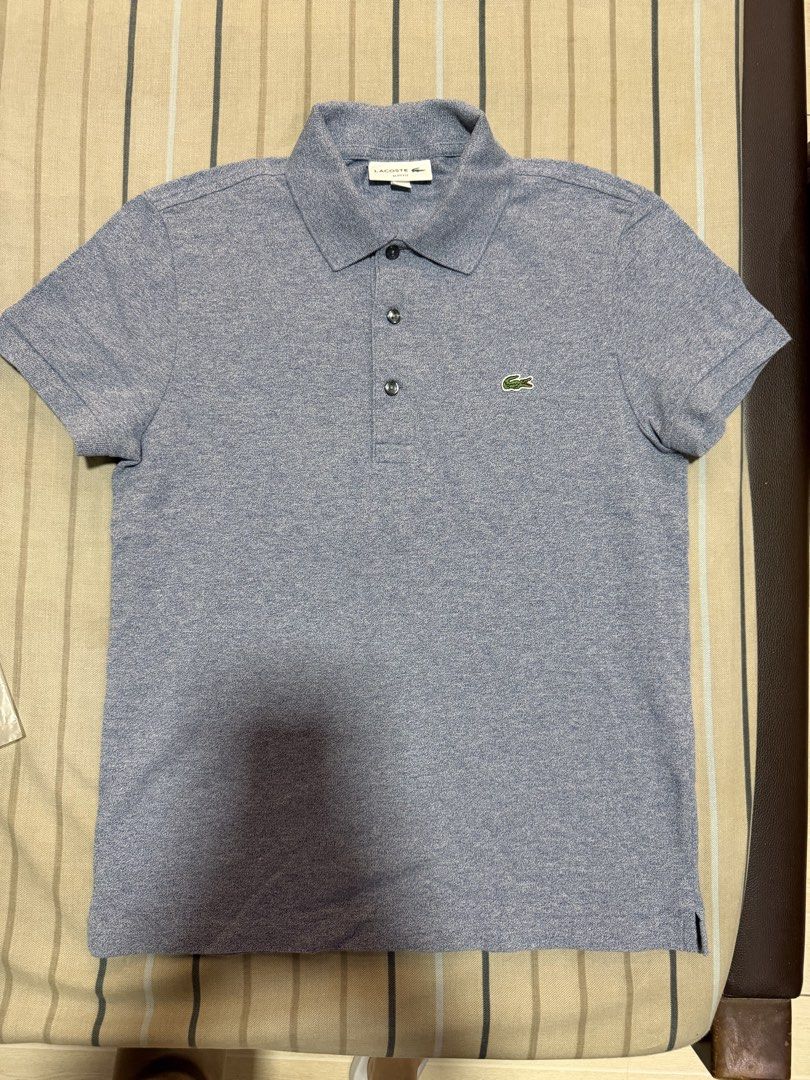 Lacoste Slim Fit Polo Shirt (Category: Tshirts & Polo Shirts ) located in Valenzuela. Submitted by rachmcadams (Listing ID 1459581394, Image 1). Description: P2,100 slightly negotiable! • 100% original (PH store bought) • Size: FR 2 / US XS Slim Fit • Fits up to small body frame • No issue. Mint condition. P.S. It's a bluish/purplish gray. Special color—pricier than the classic ones. Decluttering my boyfriend's closet. Money back guarantee..
