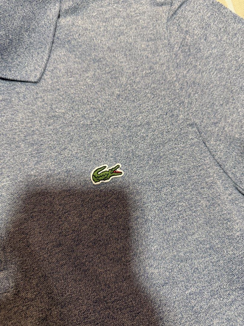 Lacoste Slim Fit Polo Shirt (Category: Tshirts & Polo Shirts ) located in Valenzuela. Submitted by rachmcadams (Listing ID 1459581394, Image 3). Description: P2,100 slightly negotiable! • 100% original (PH store bought) • Size: FR 2 / US XS Slim Fit • Fits up to small body frame • No issue. Mint condition. P.S. It's a bluish/purplish gray. Special color—pricier than the classic ones. Decluttering my boyfriend's closet. Money back guarantee..