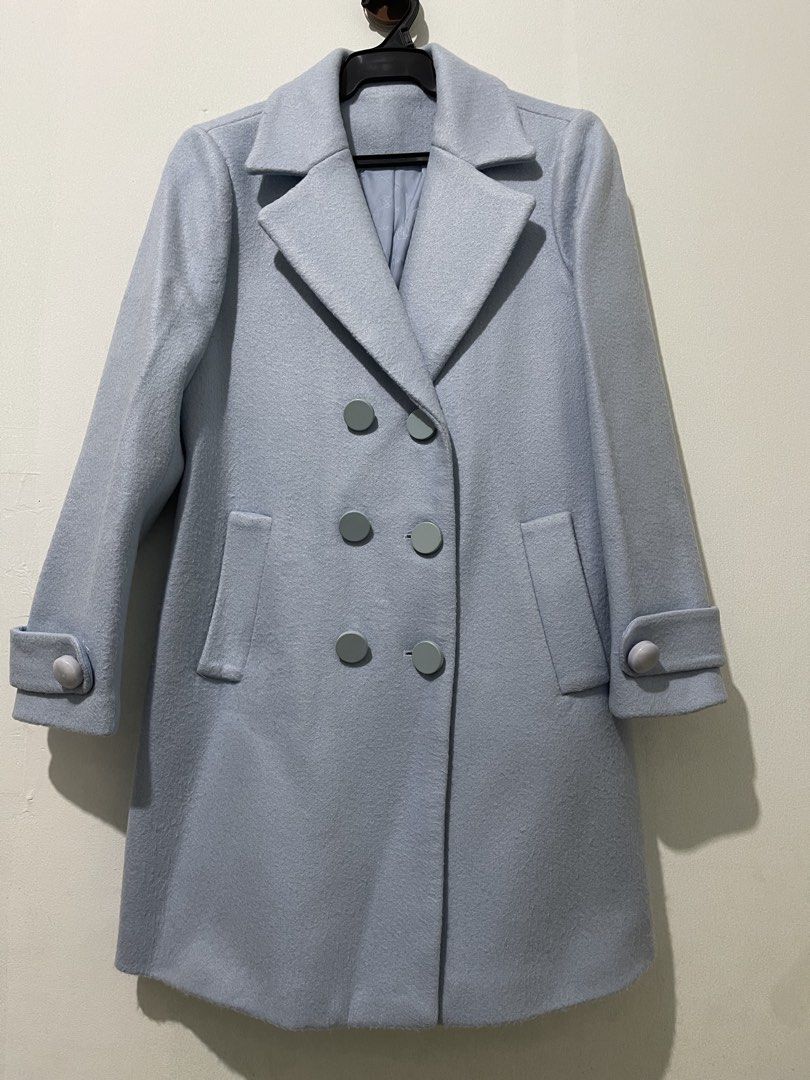 Light Blue Double Breasted Wool Blend Coat (Category: Coats, Jackets and Outerwear) located in Quezon City. Submitted by witchinthecity (Listing ID 1459601482, Image 1). Description: - Classic double-breasted coat - Lovely light blue shade - Button closure - Cuff details - Two front pockets - Ideal for layering over outfits - Great for cooler weather -dry cleaned - fits S-M - 31.5 inches shoulder to hem -lighly used in South Korea.