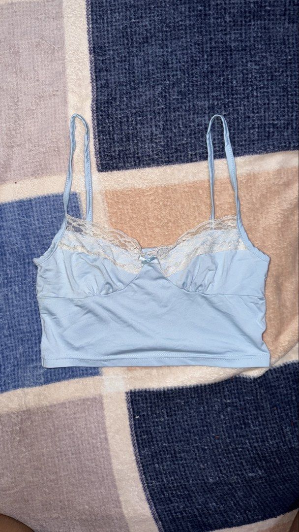 Light Blue Lace Trim Cami Top (Category: Sleeveless) located in Quezon City. Submitted by e182885da6246a5b75aac67add07a3 (Listing ID 1459534680, Image 1). Description: - Cute light blue cami top - Features lace trim along neckline - Small bow detail - Perfect for layering or wearing solo - Soft and stretchy material.
