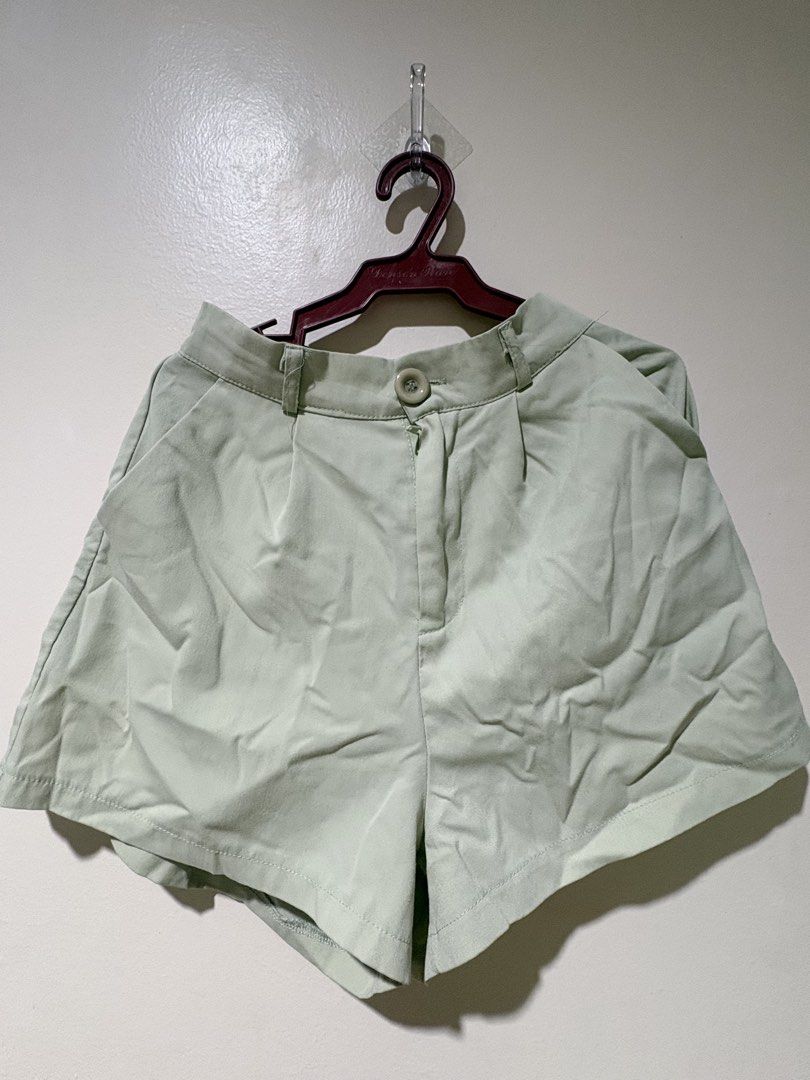 Light Green Pleated High-Waisted Shorts (Category: Shorts) located in Manila. Submitted by gabriellea00749 (Listing ID 1459651084, Image 2). Description: - Light green color - High-waisted fit - Front pleats - Button closure - Side pockets - Linen-blend fabric - Versatile for casual or dressed-up looks - Message me for measurements -Price is still negotiable :).