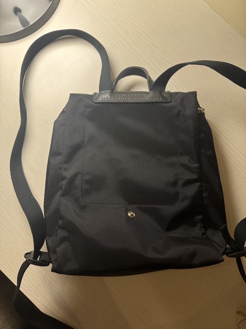 Longchamp Le Pliage Backpack (Category: Backpacks) located in Quezon City. Submitted by krc_preloved (Listing ID 1459651499, Image 2). Description: - Authentic - Color: Black - Very minor signs of wear - RFS: I do not use it anymore.