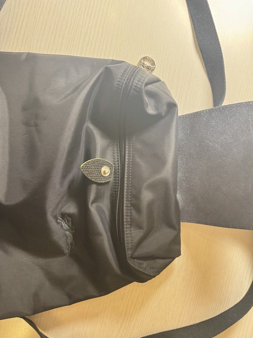 Longchamp Le Pliage Backpack (Category: Backpacks) located in Quezon City. Submitted by krc_preloved (Listing ID 1459651499, Image 3). Description: - Authentic - Color: Black - Very minor signs of wear - RFS: I do not use it anymore.