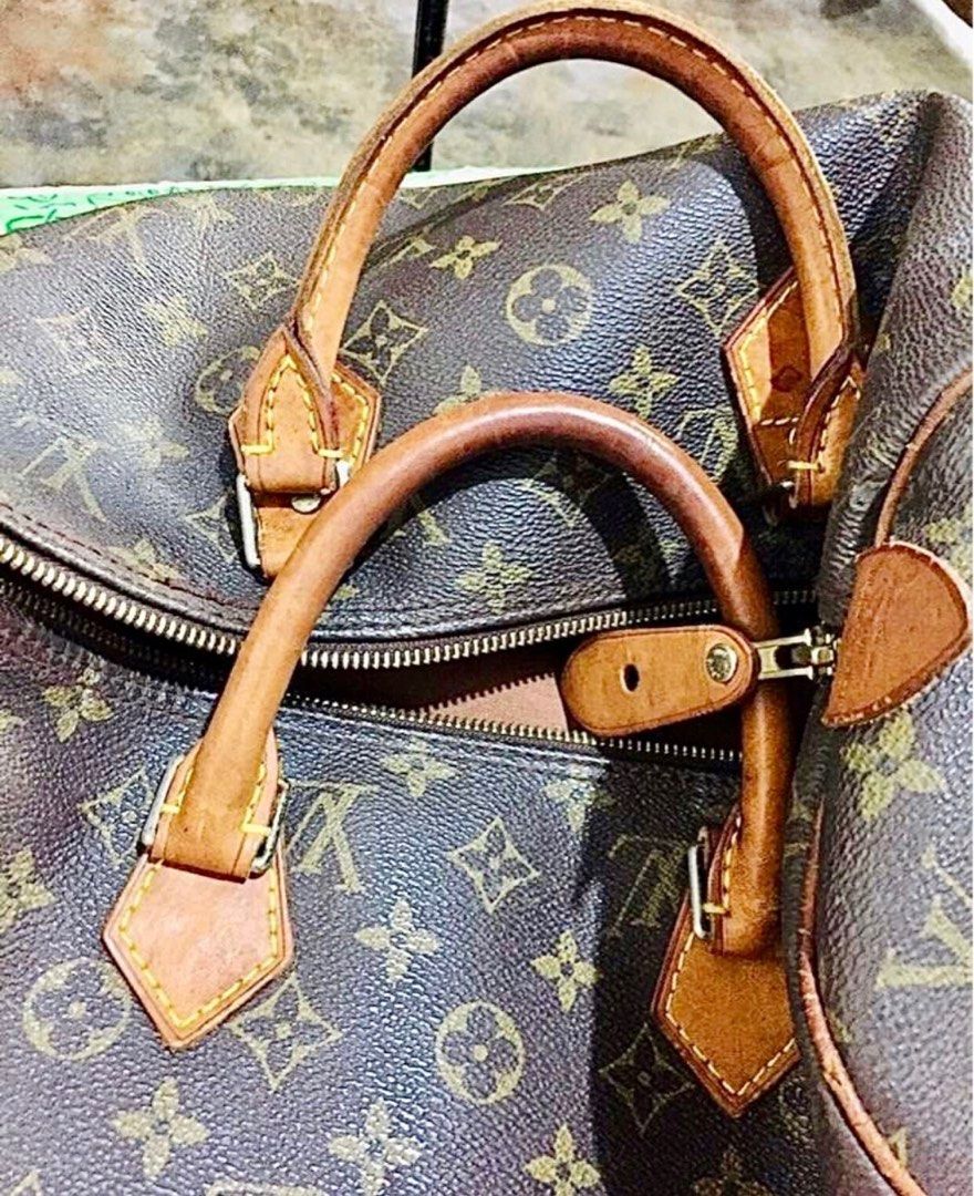 Louis Vuitton Monogram Speedy 30 (Category: Luxury Bags & Wallets) located in Caloocan City. Submitted by hardestea2026 (Listing ID 1459585696, Image 2). Description: - Authenticity not guaranteed Louis Vuitton Speedy 30 - Classic Monogram Canvas - Vachetta Leather Trim - Zipper Closure - Clean Interior - Includes Lock and Key - Date Code: M511624 - Note: Some signs of wear on leather handles and trim.