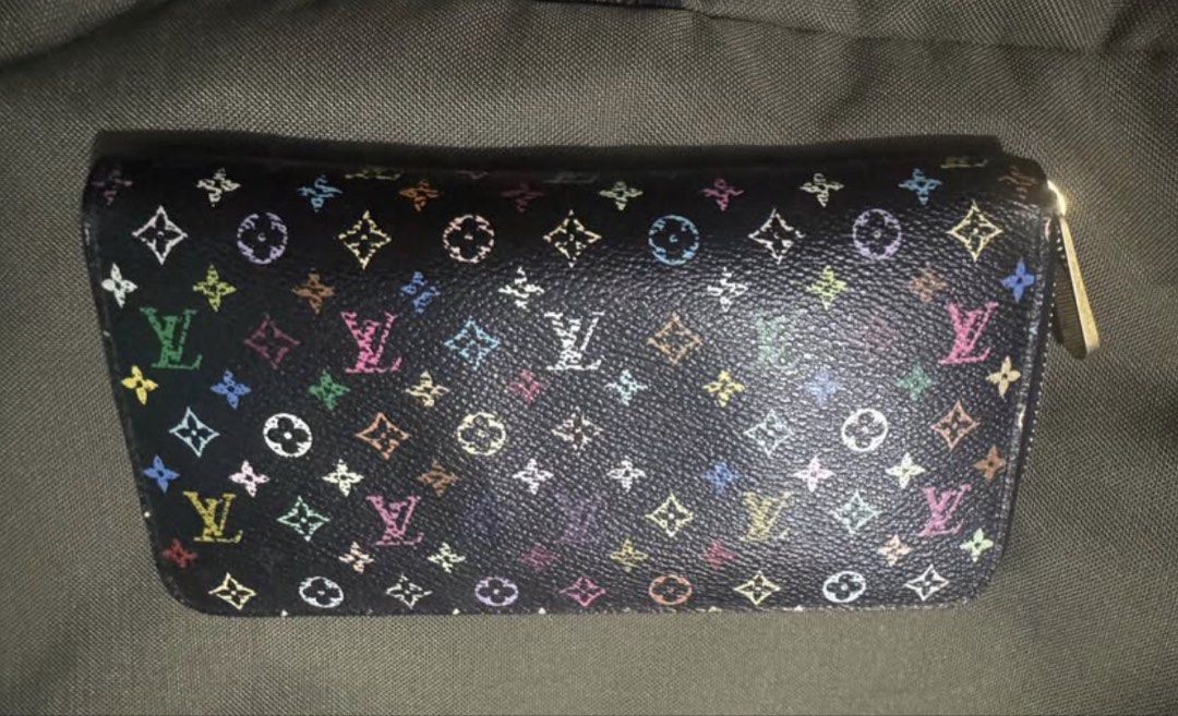 Louis Vuitton Multicolor Monogram Zip Around Wallet (Category: Luxury Bags & Wallets) located in Manila. Submitted by joshua_23_ (Listing ID 1459595503, Image 2). Description: -BROKEN ZIPPER!!!! - Authentic Louis Vuitton wallet - Iconic multicolor monogram on black - Vibrant pink interior -No Box Wallet Only! .