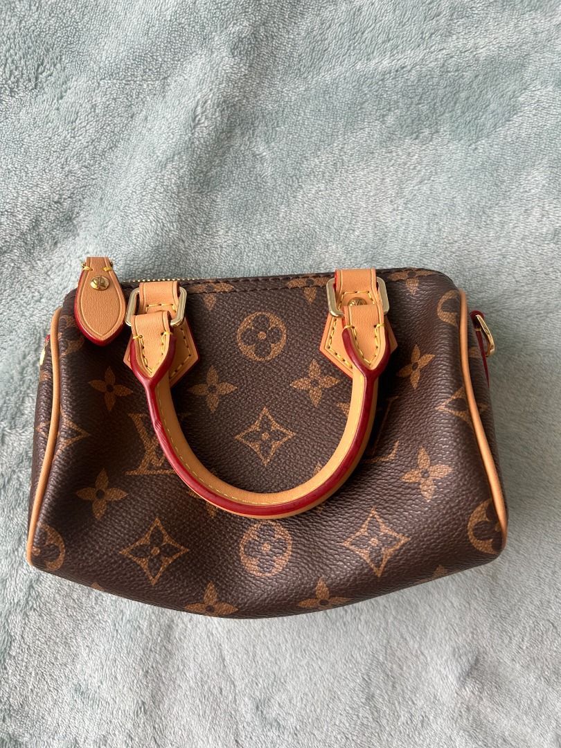 Louis Vuitton Speedy Nano in Monogram Canvas 👜 (Category: Luxury Bags & Wallets) located in Dasmarinas. Submitted by kikayjoe (Listing ID 1459517825, Image 2). Description: - Grade A rep, about 85-90% to the OG - NO damage at all, no odor etc. - Comes with full inclusions: LV Box, dust bag, receipt holder, etc - Comes with FREEBIES: 2 twillies - Lightly used! Got compliments with this bag! Took care of it like my baby, haha 🥰 - SLIGHTLY NEGOTIA