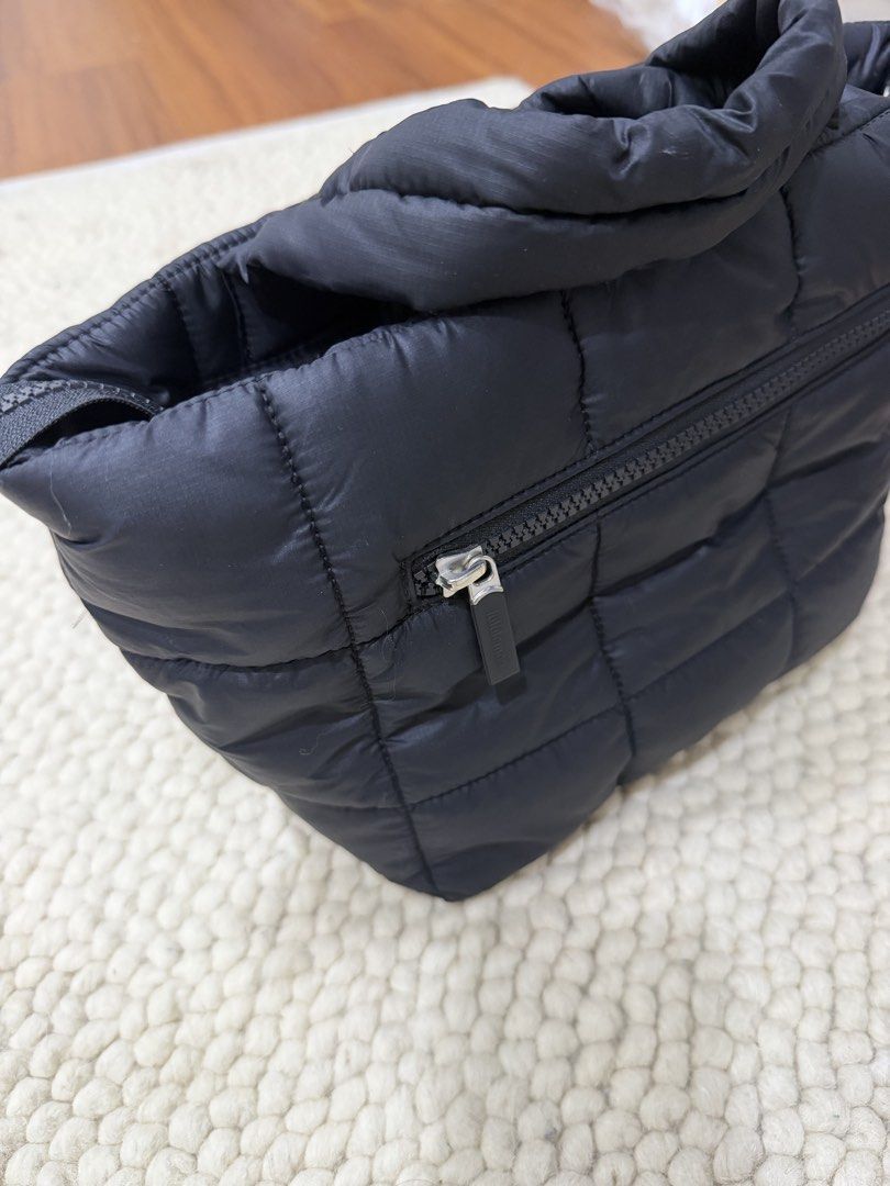 Lululemon Everywhere Bag Black (Category: Cross-body Bags) located in Makati City. Submitted by marowebg (Listing ID 1459573611, Image 2). Description: - Black Lululemon tote bag - Quilted puffer style - Zipper closure - Detachable crossbody strap included - Dimensions: 21.9cm x 14.6cm - Made with recycled materials - Designed in Vancouver.