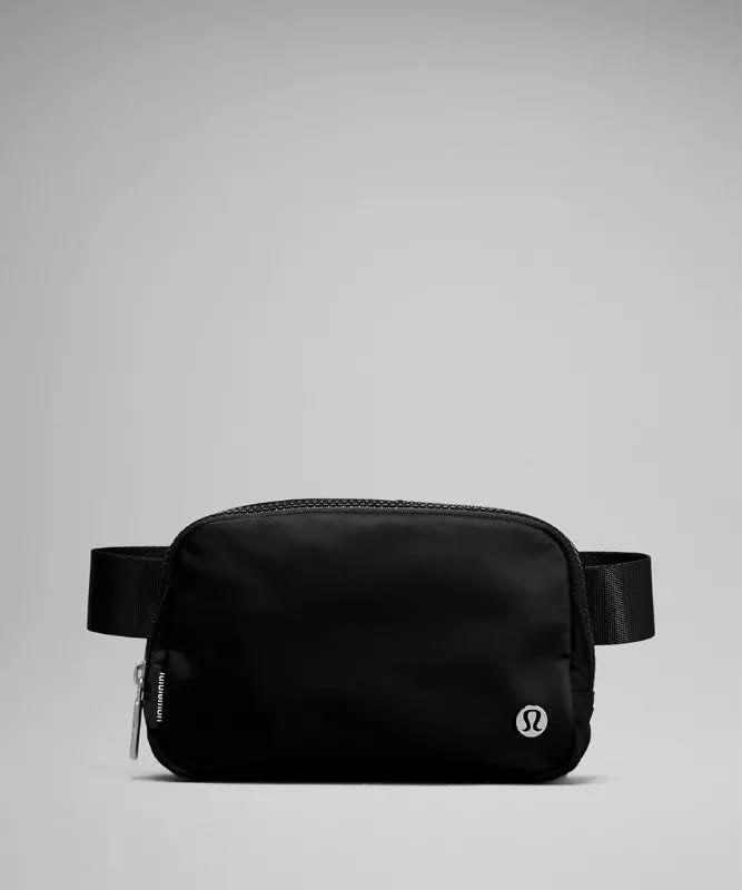 Lululemon Everywhere Belt Bag Black (Category: Cross-body Bags) located in Mandaluyong City. Submitted by nutellay17 (Listing ID 1459614178, Image 1). Description: - Classic black Lululemon belt bag - Water-repellent fabric - Adjustable strap for crossbody or waist wear - Zipper closure - Small logo detail on the front - Ideal for carrying everyday essentials.