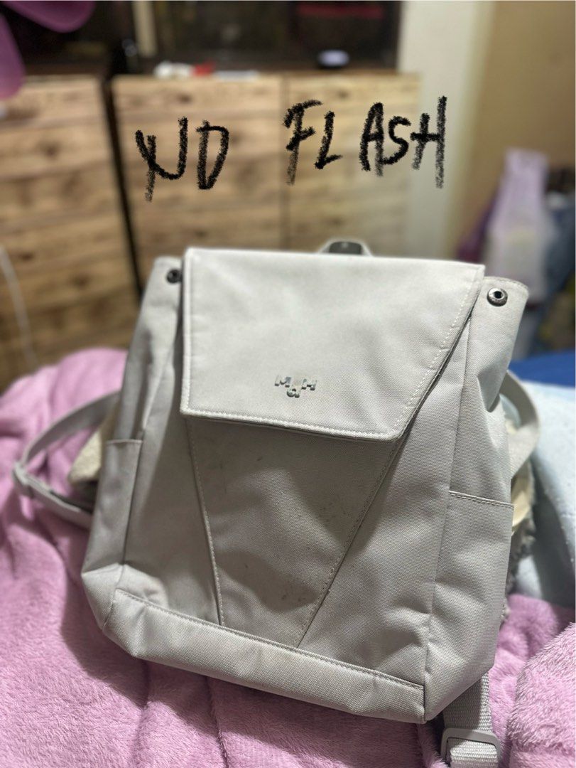 MAH Gray/Grey Backpack (Category: Backpacks) located in Dinalupihan. Submitted by ashleylazarte (Listing ID 1459633701, Image 2). Description: Feel free to send an offer ^ Condition: Pre-owned. Still usable, with visible signs of wear. Flaws: - Has stains in some areas and needs washing/cleaning. - The paint/print on the brand has started to peel or fade due to age and use. - Some rust/discoloration can be seen on the metal part inside the bag. F