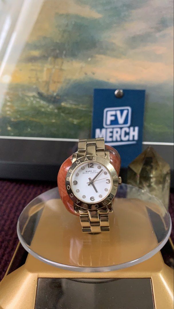 Marc by Marc Jacobs- gold-tone Watch (Category: Women's Watches) located in Mandaluyong City. Submitted by fv_merch (Listing ID 1459631058, Image 2). Description: Marc by Marc Jacobs- gold-tone or rose gold-tone steel with linked metal bracelet strap -all original (dial, strap, etc) *All Stainless steel *water resistant 5 atm *women's watch Dial+Bezel Size: 2.2cm Strap size: 17.5cm Php 2500.