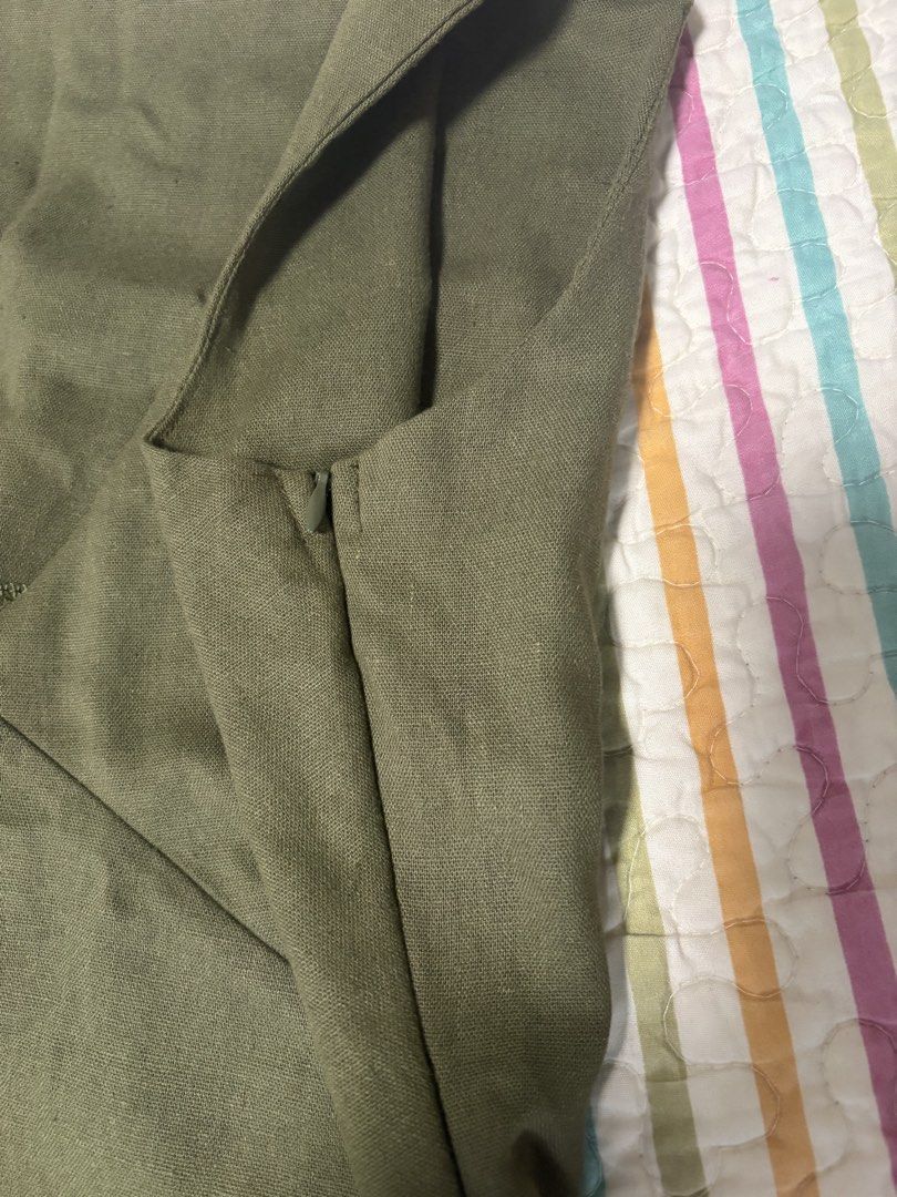 Maya Dress (Category: Dresses) located in Cainta. Submitted by PreLovedbyANM (Listing ID 1459548798, Image 3). Description: - Olive green sleeveless mini dress - Made from breathable linen fabric - Flattering V-neckline - A-line silhouette for a comfortable fit - Hidden side zipper closure - Versatile for casual outings or dressing up - Pairs well with sandals or sneakers Washed never used Size - Large See size guide for measurements No COD No ot