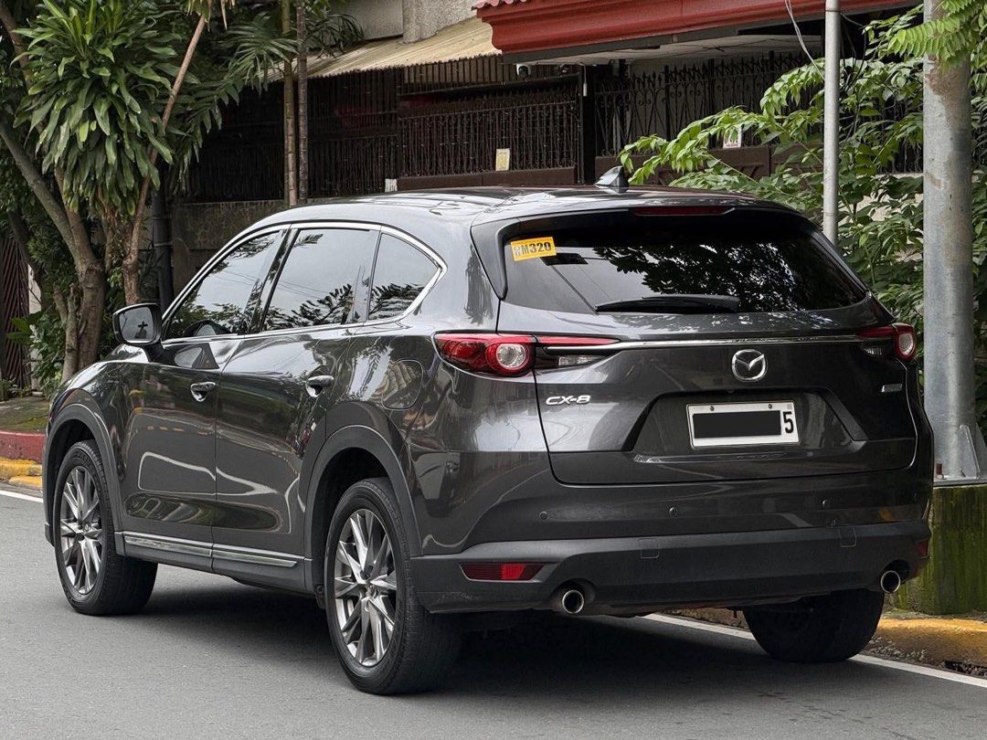 Mazda CX-8 AWD Signature Auto (Category: Used Cars) located in Manila. Submitted by quality_cars (Listing ID 1459572195, Image 2). Description: FOR SALE / FINANCING ❗️ 2022 Mazda CX-8 AWD Signature From a Brand New Price of Over ₱2.4M, own this flagship Mazda SUV for less than half the cost. ✨ Top-of-the-Line Signature Variant ✨ i-ACTIV All-Wheel Drive (AWD) ✨ Premium 7-Seater Luxury SUV ✔ 2.5L SKYACTIV-G Engine ✔ Automatic Transmission ✔ Nappa L