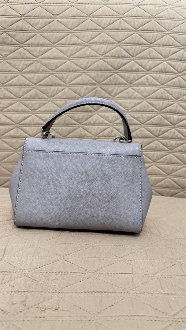 Michael Kors Grey Leather Top Handle Bag with Strap (Category: Luxury Bags & Wallets) located in Tanza. Submitted by jatdown (Listing ID 1459554101, Image 2). Description: MICHAEL KORS Light Gray Satchel - slightly used - hardware in perfect condition - bought for PHP 8000 - selling for 4000, negotiable Meet-Up / Delivery - Vito Cruz, anywhere along Taft Ave. - Tanza, Cavite - delivery fee will be shouldered by the buyer RFS: migration declutteri