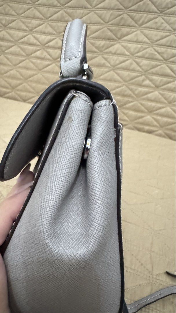 Michael Kors Grey Leather Top Handle Bag with Strap (Category: Luxury Bags & Wallets) located in Tanza. Submitted by jatdown (Listing ID 1459554101, Image 3). Description: MICHAEL KORS Light Gray Satchel - slightly used - hardware in perfect condition - bought for PHP 8000 - selling for 4000, negotiable Meet-Up / Delivery - Vito Cruz, anywhere along Taft Ave. - Tanza, Cavite - delivery fee will be shouldered by the buyer RFS: migration declutteri