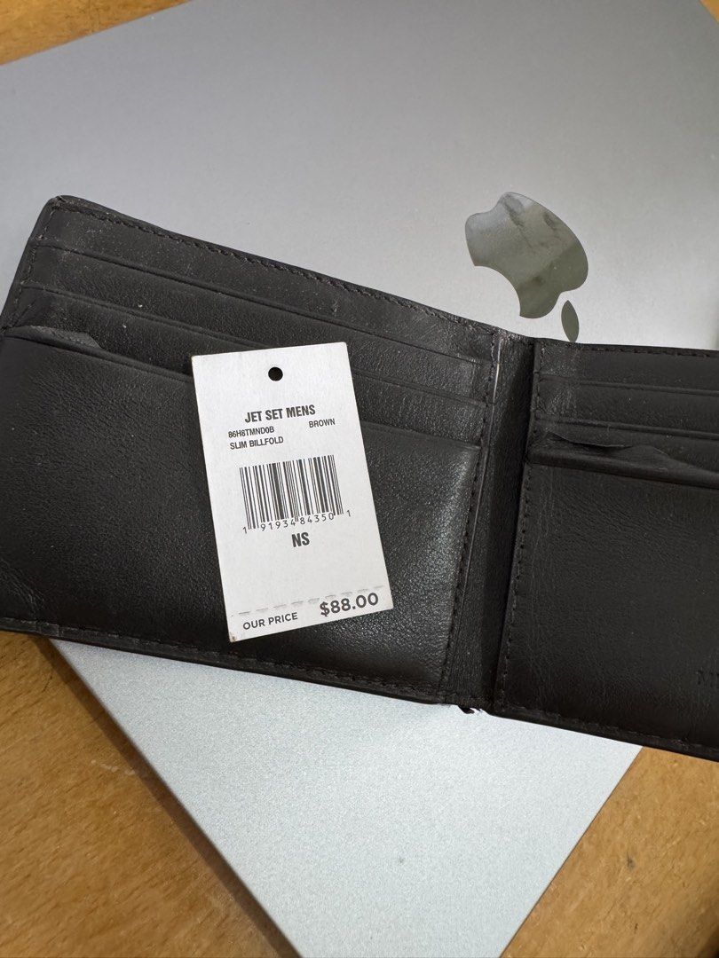 Michael Kors Men's Wallet (Category: Wallets & Card Holders) located in Manila. Submitted by closet.r3set (Listing ID 1459509358, Image 2). Description: Michael Kors Jet Set men's slim billfold wallet Bought from Guam Usa Barely used Location: Manila.