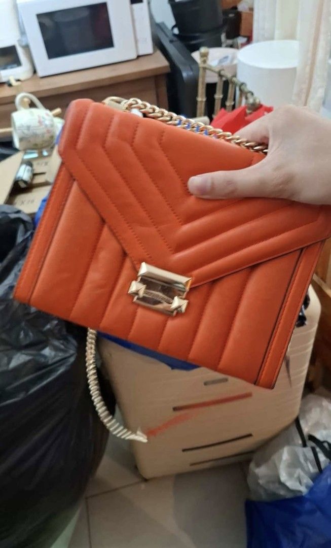 Michael Kors Orange Quilted Leather Chain Shoulder Bag (Category: Luxury Bags & Wallets) located in Manila. Submitted by isellforu423 (Listing ID 1459499663, Image 2). Description: Michael Kors Whitney Quilted Leather Shoulder Bag orig no papers you can check.
