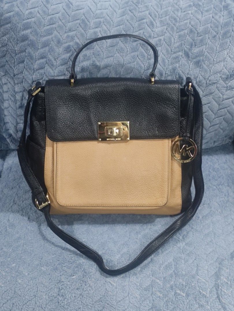 Michael Kors Two-Tone Leather Shoulder Bag (Category: Luxury Bags & Wallets) located in Cainta. Submitted by kluxurychoices (Listing ID 1459631840, Image 1). Description: Michael Kors Bag U.S. bought very nice in actual .