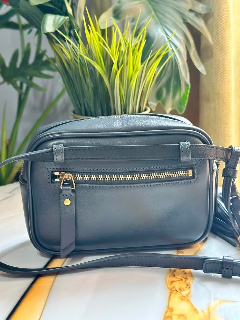 Mini Saint Laurent YSL Camera Bag Black Chevron Leather (Category: Luxury Bags & Wallets) located in Quezon City. Submitted by hellopatchi (Listing ID 1459538581, Image 2). Description: Mini Crossbody Bag Tassle | Super cute! Rank A condition | fits iphone pro max Authentic Saint Laurent YSL Camera Bag - Color: Black - Material: Chevron Leather - Hardware: Gold - Closure: Zip - Strap: Adjustable - Measurements: Depth 6cm, Width 23cm, Height 16cm,