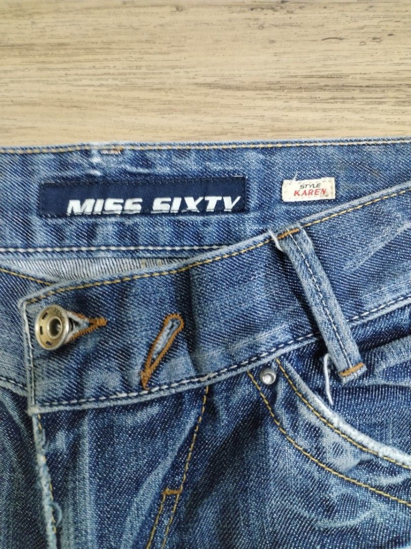 Miss Sixty Lowrise Karen Style Jeans (Category: Jeans) located in Mendez-Nunez. Submitted by eidryl2006 (Listing ID 1459543821, Image 2). Description: - Miss Sixty Karen style jeans - Blue denim with a slight wash - Clover patch detail on back pocket - Size: 27 - Ideal for casual wear -Y2K -Issue: Loose button but repairable.