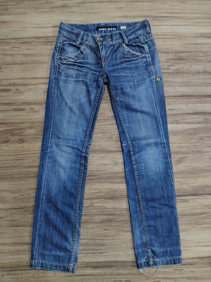 Miss Sixty Lowrise Karen Style Jeans (Category: Jeans) located in Mendez-Nunez. Submitted by eidryl2006 (Listing ID 1459543821, Image 1). Description: - Miss Sixty Karen style jeans - Blue denim with a slight wash - Clover patch detail on back pocket - Size: 27 - Ideal for casual wear -Y2K -Issue: Loose button but repairable.