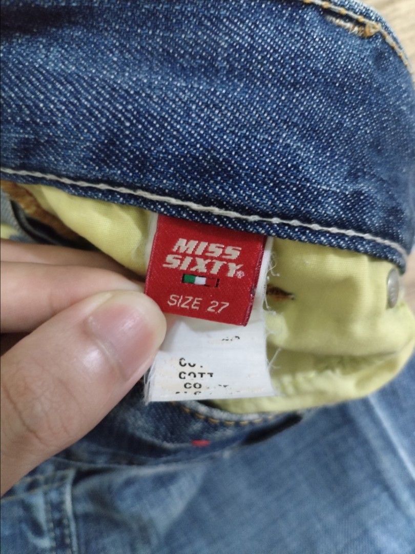 Miss Sixty Lowrise Karen Style Jeans (Category: Jeans) located in Mendez-Nunez. Submitted by eidryl2006 (Listing ID 1459543821, Image 3). Description: - Miss Sixty Karen style jeans - Blue denim with a slight wash - Clover patch detail on back pocket - Size: 27 - Ideal for casual wear -Y2K -Issue: Loose button but repairable.