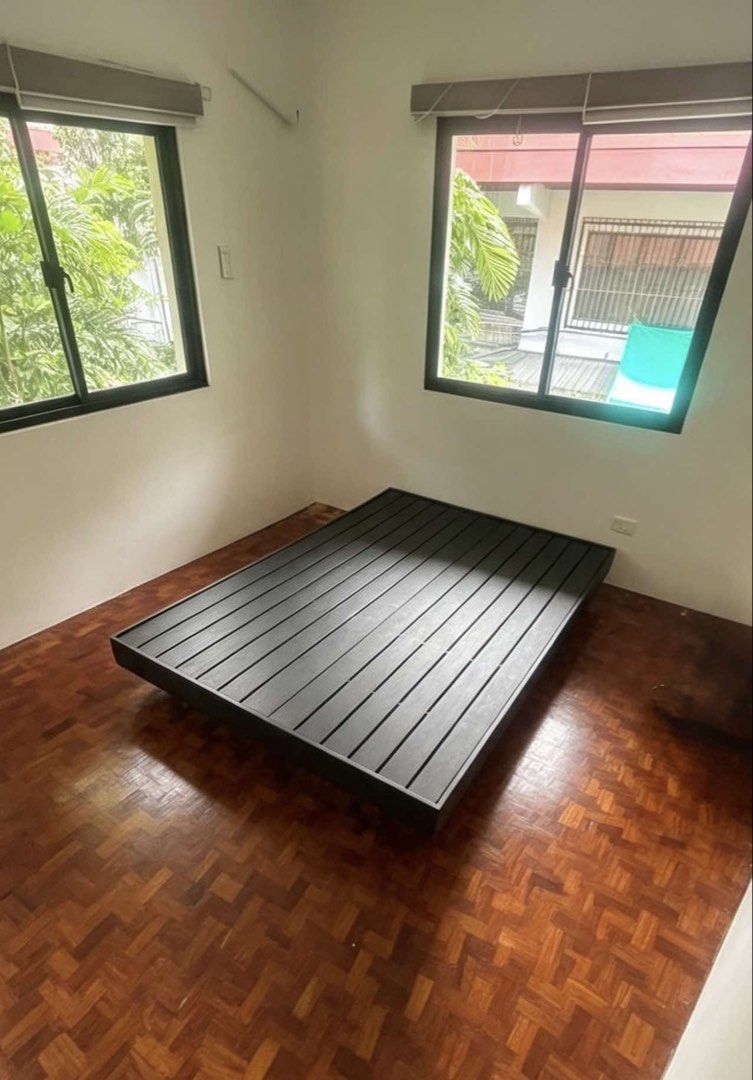 Modern Black Floating Bed Frame - Queen Size (Category: Bed Frames & Mattresses) located in Manila. Submitted by shuri_19 (Listing ID 1459538454, Image 3). Description: - Sturdy black queen platform bed frame - Minimalist, modern design with clean lines - Slatted base for excellent mattress support - Fits a standard queen-size mattress - Easy to assemble - Perfect for any bedroom.