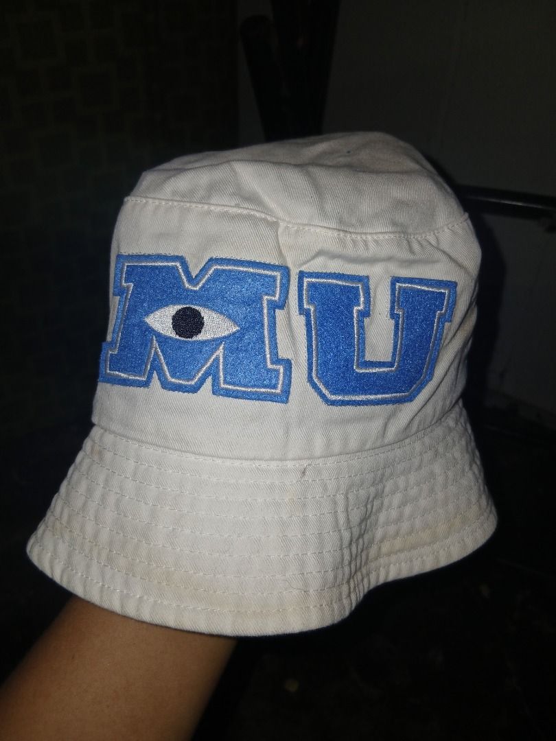 Monsters University MU Bucket Hat (Category: Caps & Hats) located in Manila. Submitted by cosmicturtle.d1b615 (Listing ID 1459532428, Image 1). Description: - White bucket hat - Features Monsters University 'MU' logo on front - Embroidered pennants on the side - Great for fans of the movie - Shows some signs of wear, particularly on the brim - Cool addition to any collection.