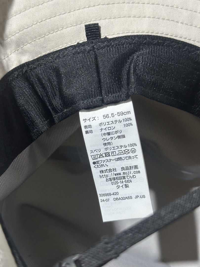 MUJI Bucket Hat Beige Cotton Polyester Nylon (Category: Hats & Beanies) located in Baguio. Submitted by miss_misery (Listing ID 1459651844, Image 2). Description: - Brand: MUJI - Color: Beige - Material: Cotton, Polyester, Nylon - Features: Adjustable drawstring for a secure fit - Benefits: Ideal for sunny days, easy to pack and wear - Condition: Please check photos for details.