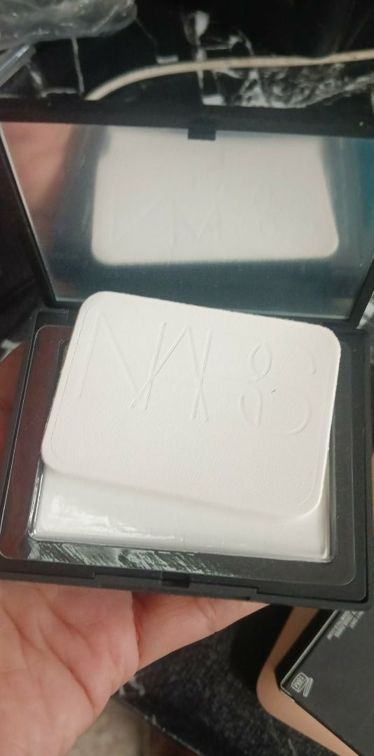 NARS Light Reflecting Pressed Setting Powder (Category: Makeup) located in Caloocan City. Submitted by goldendeer.a81a9f (Listing ID 1459496407, Image 1). Description: - NARS Light Reflecting Pressed Setting Powder - Shade: Translucent - Key Benefits: Blurs imperfections, sets makeup - Features: Compact with mirror for easy touch-ups - Reason for Selling: Not the correct shade for the seller.