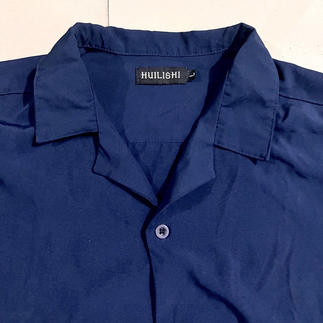 Navy Blue Polo Shirt (Category: Tshirts & Polo Shirts ) located in Manila. Submitted by pczxss (Listing ID 1459497496, Image 2). Description: Size: Large.