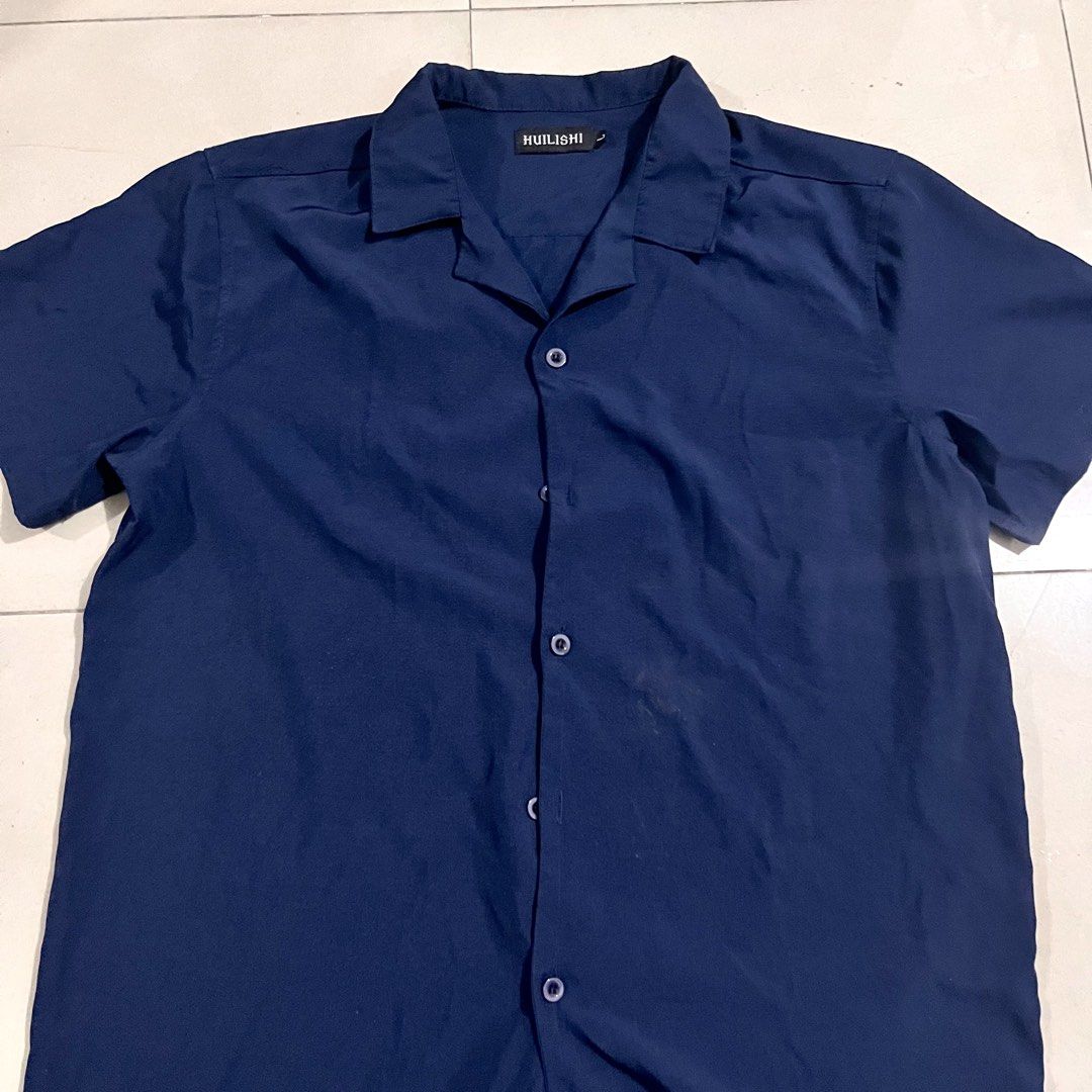 Navy Blue Polo Shirt (Category: Tshirts & Polo Shirts ) located in Manila. Submitted by pczxss (Listing ID 1459497496, Image 1). Description: Size: Large.