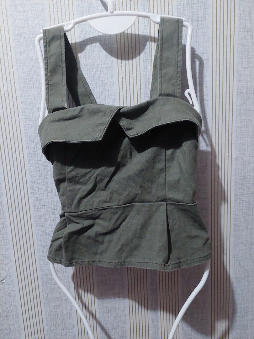 Navy Green Sleeveless Top (Category: Sleeveless) located in Tarlac. Submitted by prelovedtarlac22 (Listing ID 1459634968, Image 1). Description: Navy Green Sleeveless Top - Size Small to Semi Large (Garterized Back) RFS: Decluttering my closet ❤️ 📍Tarlac based - No COD (Payment First) to avoid being scammed - Shipping fee will be shouldered by the buyer - Once the payment has been received, we will ship the item immediately - Courier: J&T Expres