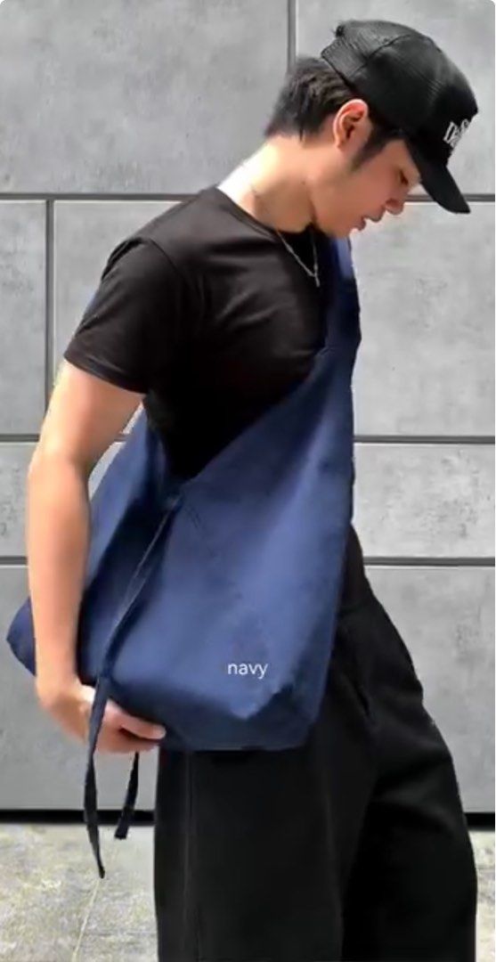 Navy Sling Bag (Category: Sling Bags) located in Manila. Submitted by turamichae18572 (Listing ID 1459632660, Image 1). Description: -Origami Bag - Cool navy blue sling bag - Adjustable straps for a comfortable fit - Ideal for everyday use - Spacious interior, holds a good amount - Easy to carry and travel with - Simple and functional design.