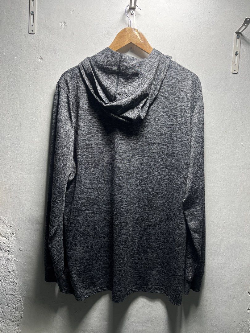 NBA Grey Heathered Reflective Hoodie (Category: Hoodies) located in Pasig City. Submitted by thrift2mnl (Listing ID 1459616825, Image 2). Description: - Grey heathered NBA hoodie - Features iconic NBA logo graphic on the front - Long sleeves with ribbed cuffs - Hooded design - Size: X-Large - Ideal for casual wear or NBA fans.