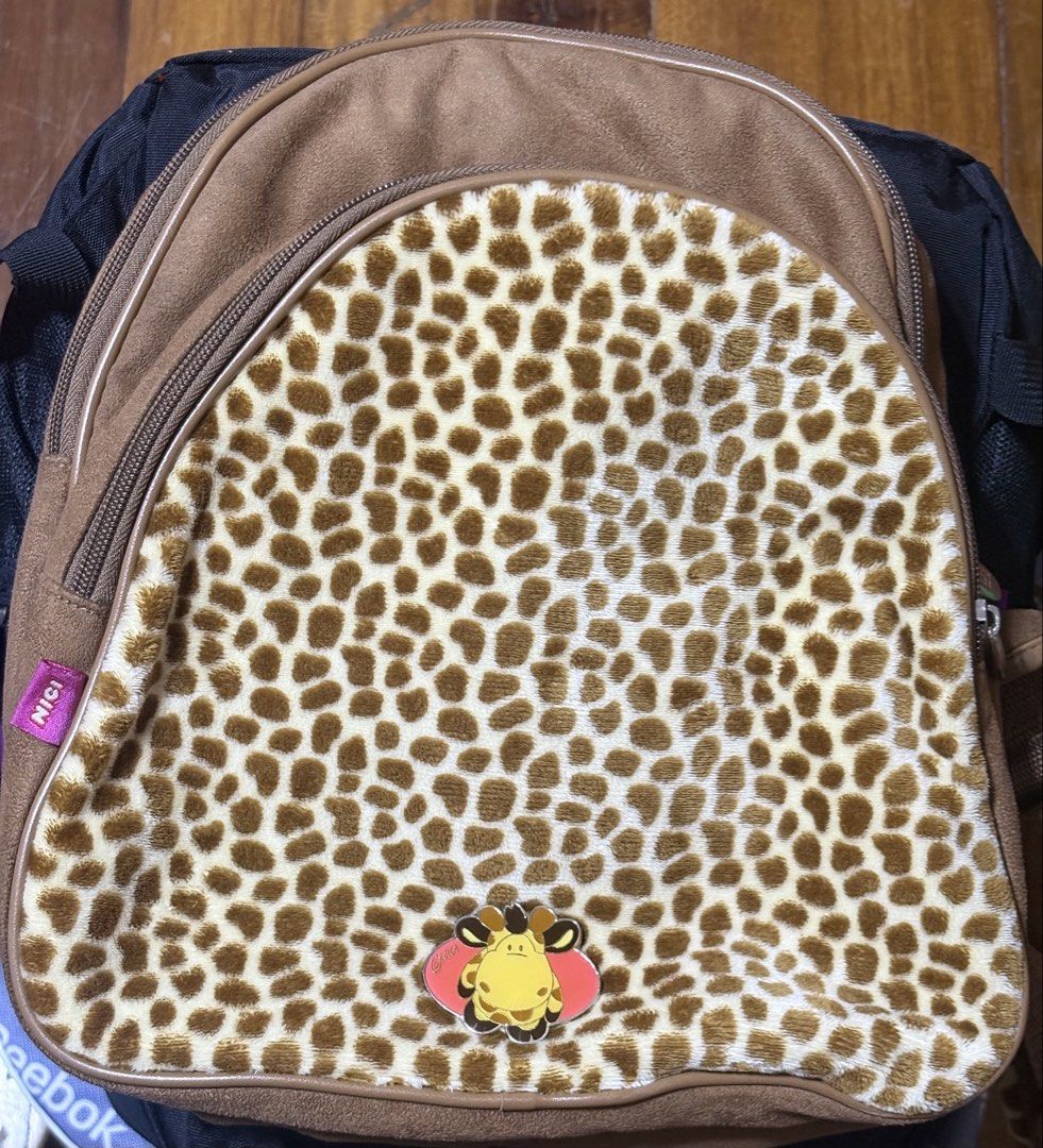 Nici Brown Suede with Leopard Print Messenger Bag (Category: Babies & Kids Fashion) located in Binan City. Submitted by de.clutterbyM (Listing ID 1459617738, Image 2). Description: Used once. Nici Brown Suede with Leopard Print messenger Bag Two Large Zippered Compartments for Organizing and a Smaller Zippered Interior Compartment..