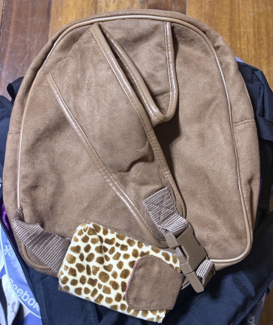 Nici Brown Suede with Leopard Print Messenger Bag (Category: Babies & Kids Fashion) located in Binan City. Submitted by de.clutterbyM (Listing ID 1459617738, Image 3). Description: Used once. Nici Brown Suede with Leopard Print messenger Bag Two Large Zippered Compartments for Organizing and a Smaller Zippered Interior Compartment..