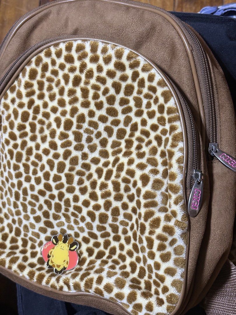 Nici Brown Suede with Leopard Print Messenger Bag (Category: Babies & Kids Fashion) located in Binan City. Submitted by de.clutterbyM (Listing ID 1459617738, Image 1). Description: Used once. Nici Brown Suede with Leopard Print messenger Bag Two Large Zippered Compartments for Organizing and a Smaller Zippered Interior Compartment..