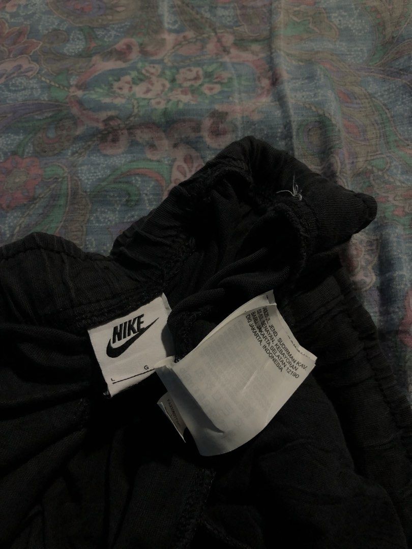 Nike Black Jogger Pants (Category: Activewear) located in Munoz. Submitted by bb_jimbo0 (Listing ID 1459614538, Image 3). Description: - Black Nike joggers - Elastic waistband with drawstring - Simple and comfy design - Ideal for lounging or workouts - Embroidered Nike logo on left leg - Made in Indonesia.