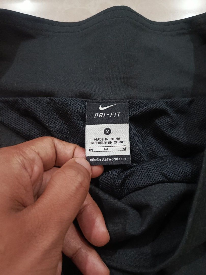Nike Dri-Fit Black Training Pants Size M (Category: Joggers) located in Cabatuan. Submitted by penthegreat (Listing ID 1459569154, Image 3). Description: Authentic 🔥🔥🔥 10/10 na sana condition may natastas pang tahi sa last picture yun lang issue at need lang wash kasi bagong kuha lang - Black Nike Dri-Fit Training Pants - Size: Medium - Material: Polyester & Spandex blend (Made in China) - Features: Elastic waistband, comfortable & breathable 