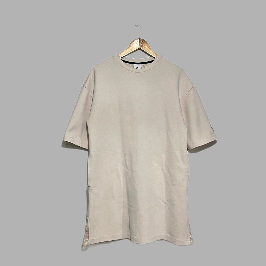 Nike Lab Essential Tech Fleece Dress (Category: Tshirts & Polo Shirts ) located in Manila. Submitted by frenzyyyy (Listing ID 1459651265, Image 1). Description: - Brand: Nike Lab - Product: Essential Tech Fleece Dress - Color: Light Beige - Size: Medium (M) - Material: Signature Tech Fleece - Features: Relaxed fit, Nike logo on sleeve - Condition: Excellent.