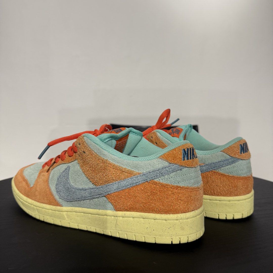 Nike SB Dunk Low Orange Emerald Rise (Category: Sneakers) located in Tanauan. Submitted by flexingthriftsph (Listing ID 1459548836, Image 3). Description: Nike SB Dunk Low Orange Emerald Rise Size 10 us Pair only No box Used 9.5/10 condition.