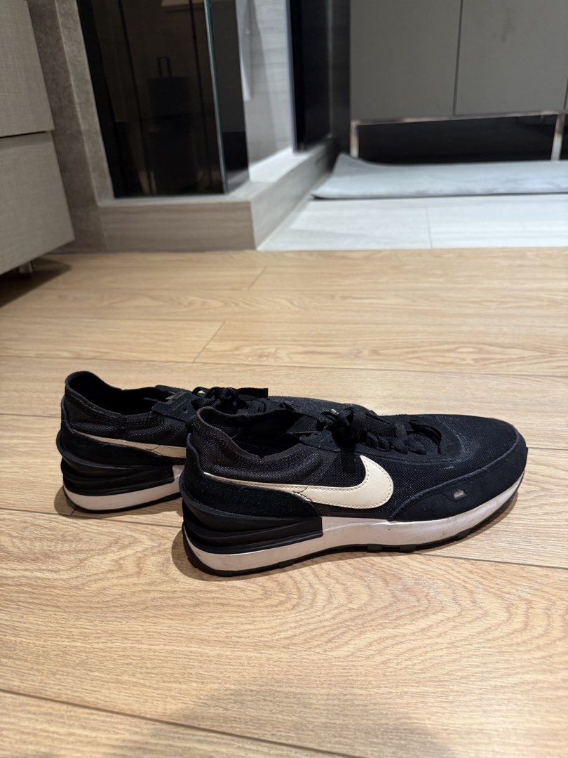 Nike Waffle One Sneakers Black White - US 8.5 (Category: Sneakers) located in Quezon City. Submitted by patpotpit (Listing ID 1459616152, Image 3). Description: - Black Nike Waffle One sneakers - Iconic white Swoosh on the side - Secure lace-up closure - Perfect for comfortable everyday wear - Good pre-loved condition with minor signs of use on the soles - Selling as they are no longer frequently worn.