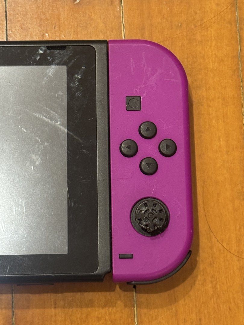 NINTENDO SWITCH V2 + EXTRA JOY-CON SET (Category: Nintendo) located in Paranaque City. Submitted by _moonshop (Listing ID 1459595203, Image 3). Description: NINTENDO SWITCH V2 + EXTRA JOY-CON SET INCLUSIONS: ✅ Nintendo Switch V2 console ✅ Purple + Yellow Joy-Con pair ✅ Extra Red + Blue Joy-Con pair ✅ Joy-Con grip/controller CONDITION: • Pre-owned / used • Console has signs of normal use • One Joy-Con joystick is damaged and needs repair — please 