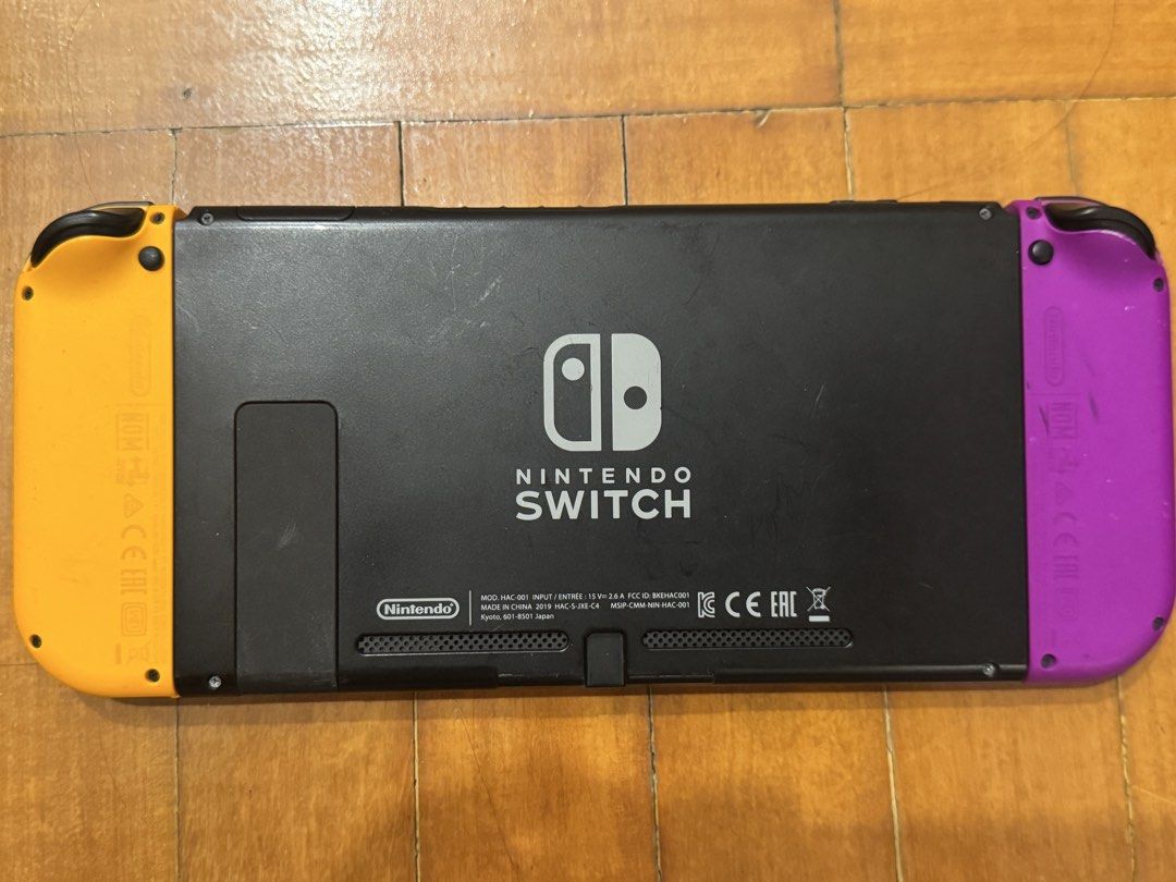 NINTENDO SWITCH V2 + EXTRA JOY-CON SET (Category: Nintendo) located in Paranaque City. Submitted by _moonshop (Listing ID 1459595203, Image 2). Description: NINTENDO SWITCH V2 + EXTRA JOY-CON SET INCLUSIONS: ✅ Nintendo Switch V2 console ✅ Purple + Yellow Joy-Con pair ✅ Extra Red + Blue Joy-Con pair ✅ Joy-Con grip/controller CONDITION: • Pre-owned / used • Console has signs of normal use • One Joy-Con joystick is damaged and needs repair — please 