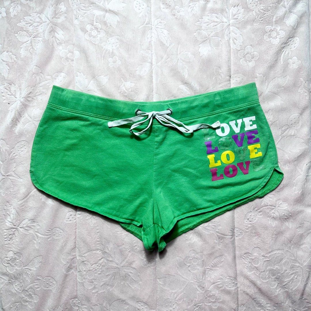 NO BOUNDARIES Green Graphic Shorts (Category: Shorts) located in San Fernando. Submitted by rianne_von (Listing ID 1459590362, Image 1). Description: Size M on tag W: 15.5 in L: 7.5 in info: ✧ bright green lounge shorts w/ multicolor “LOVE” graphic detailing ✧ contrast white drawstring w/ metal eyelets & curved dolphin-style hem ✧ excellent condition; no major flaws observed ✧ color may vary slightly due to lighting.