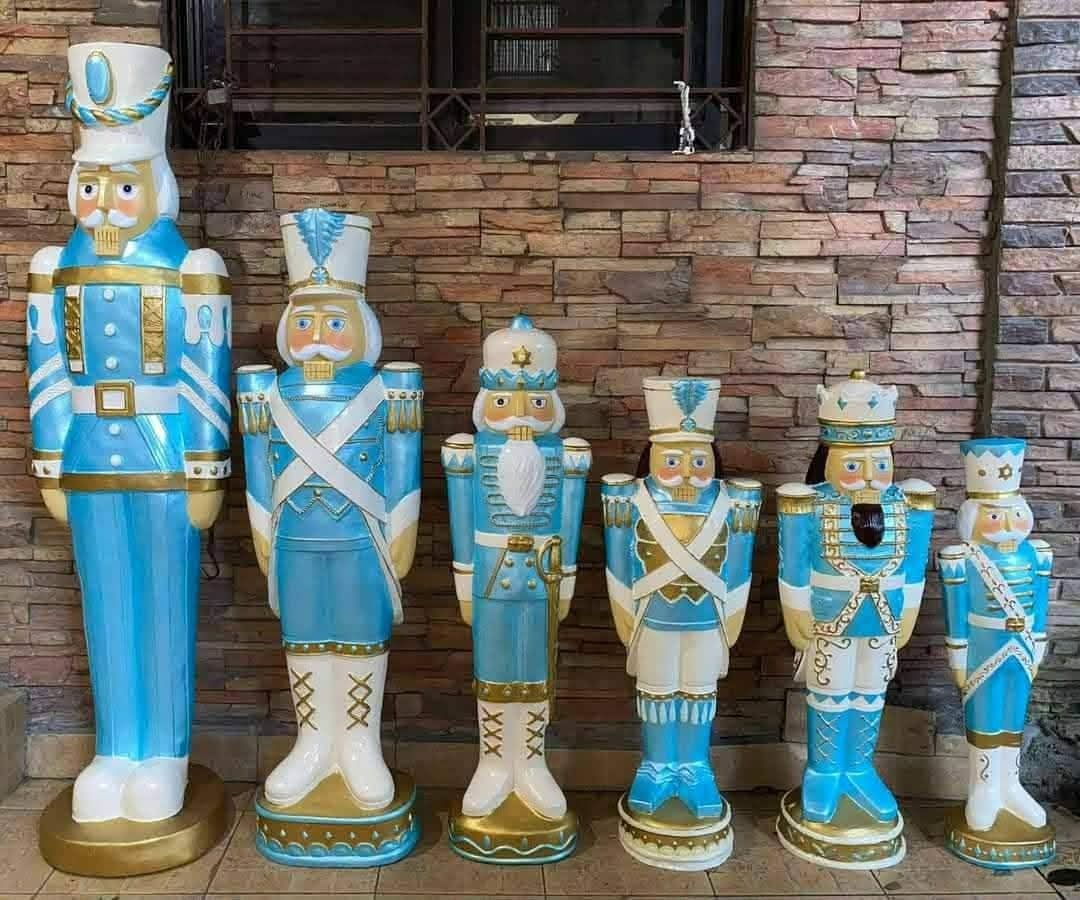 Nutcracker Figurines (Category: Other Home Decor) located in Caloocan City. Submitted by youngbird_a8dc34 (Listing ID 1459625091, Image 3). Description: Selling a set of 6 large nutcracker figurines. Available in blue/gold, purple/gold, or red/gold. Great for holiday decorations or display. Each nutcracker has a unique design and size. Adds a festive touch to any space. These are quite large and make a statement..