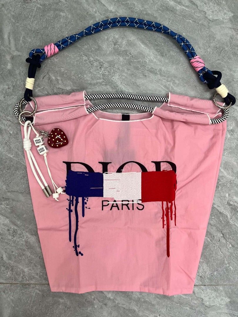 Nylon and String bag (Category: Tote Bags) located in Las Pinas. Submitted by jjh1027 (Listing ID 1459588133, Image 2). Description: - Stylish rope handles with vibrant, colorful accents - Includes a charming complementary keychain - Ideal for everyday use or as a standout fashion accessory - Offers a spacious interior for all your essentials - Ball and Chain inspired.