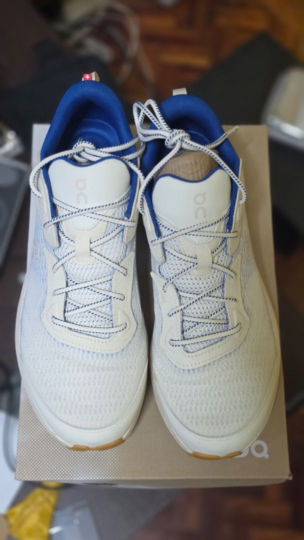 ON Cloudzone Moon Running Shoes US 9.5 (Category: Sneakers) located in Manila. Submitted by 3ple_hhh (Listing ID 1459534209, Image 3). Description: - ON Cloudzone Moon running shoes - Size: US 9.5 / EU 43 / UK 9 / JP 27.5 - Color: White with blue trimmings - Ideal for running and everyday wear - Get them now!.